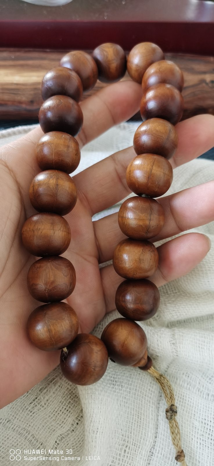 檀木圆珠手串_木纹清楚盘色深浅不一_麻绳穗木质念珠